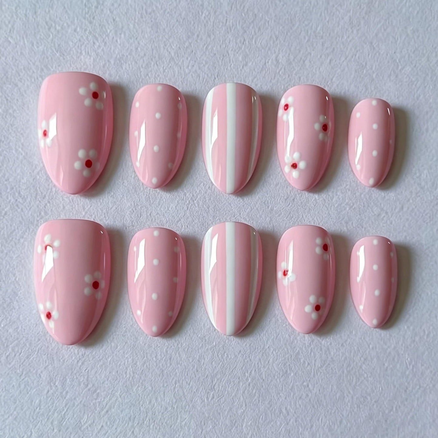 30Pcs Light Pink Press on Nails Short Almond Fake Nails with White Daisy Flowers & Polka Dots,Vertical Stripes Design, Glossy Cute False Nails Full Cover Stick on Nails for Women Manicure Decor