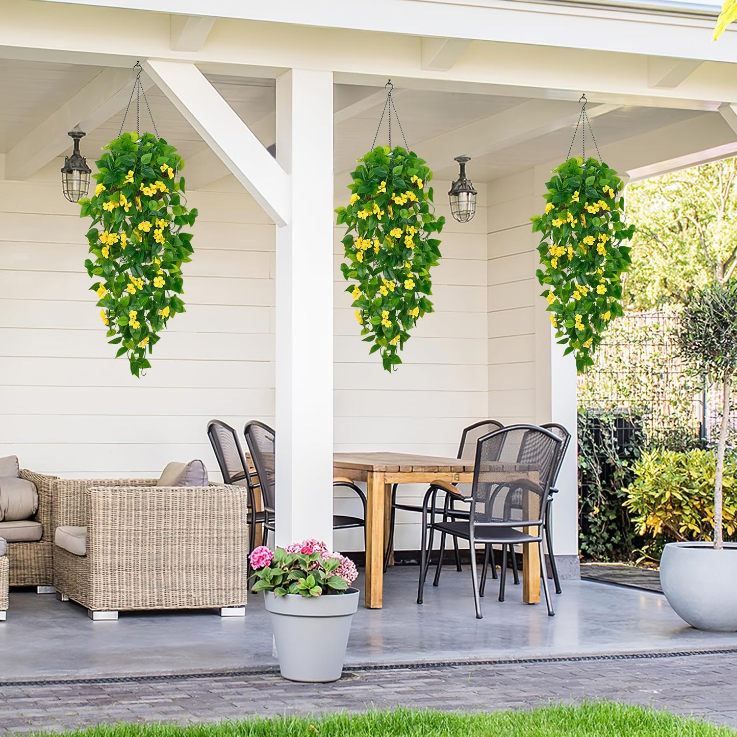 BLEUM CADE Artificial Hanging Flowers for Outdoors, 2pcs Fake Hanging Plants Pothos Vines with Yellow Flowers for Wall Home Living Room Indoor Outdoor Decor (No Baskets)